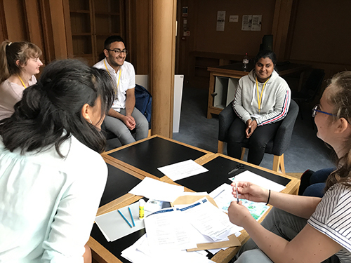 Jayne Anson with her academic challenge group, deciding what question to pick